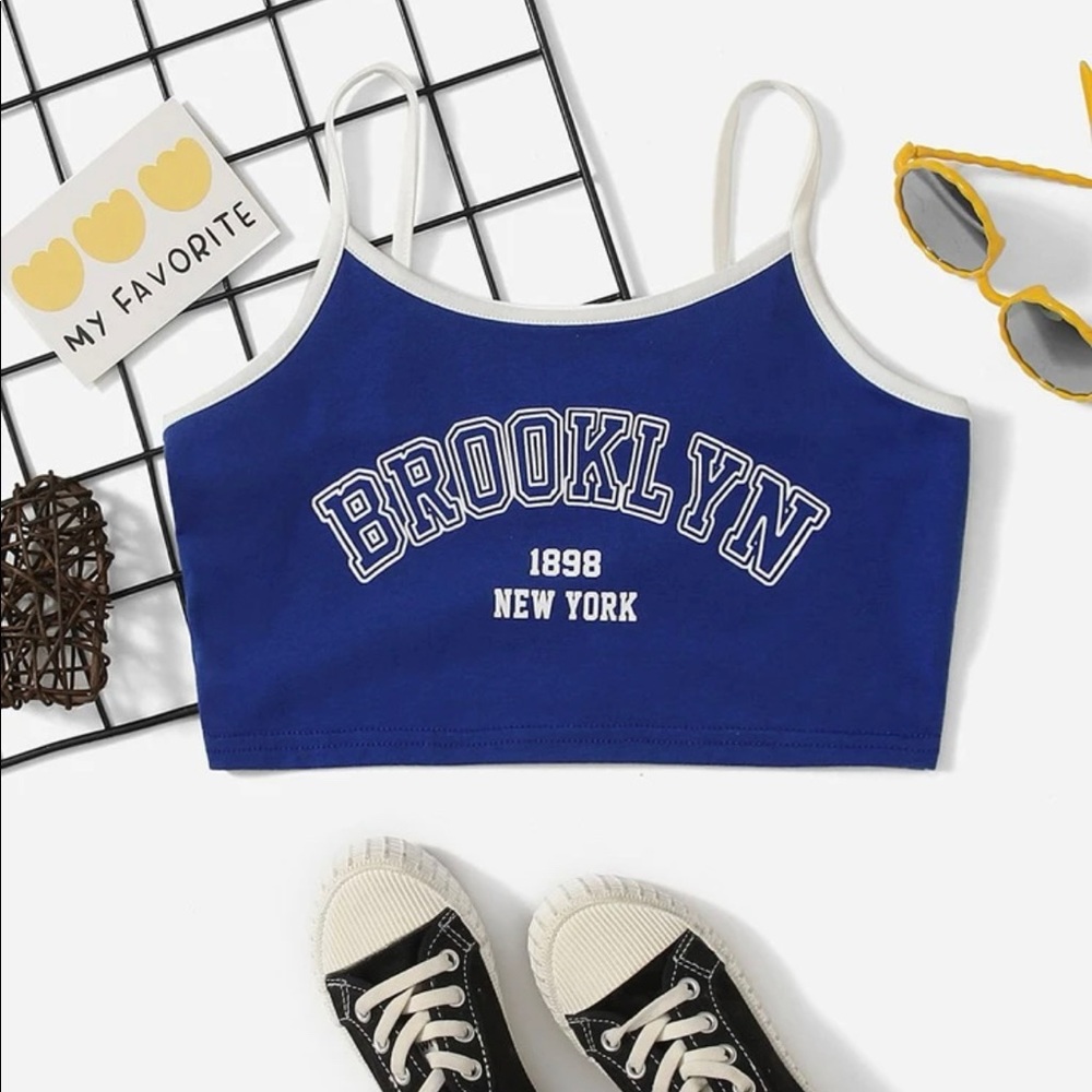 Los Angeles blue and white crop top.